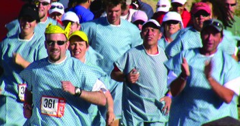 Near the end of the race Team Tumor donned hospital gowns and crossed the finish line with their final runner, Dov Siporin.
