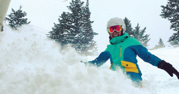 Editor Jenny Willden snowboarding in powder