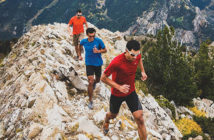 3 male Fall trail runners in the Utah Mountains