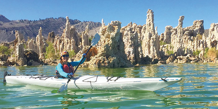 Editor Jenny Willden kayaking at Mono Lake California