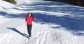 Melissa McGibbon cross-country skiing on snowy trail