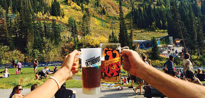 A beer cheers in the mountains during oktoberfest